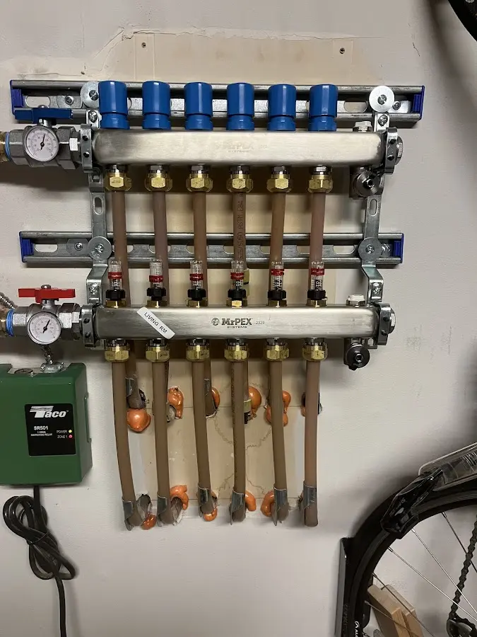 Plumber performing Gas Leak Detection at a residential property in Hesston